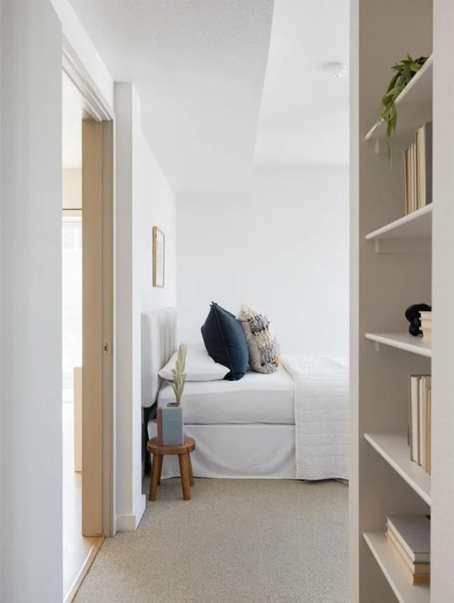 Quiet bedroom and hallway vignette from a past project